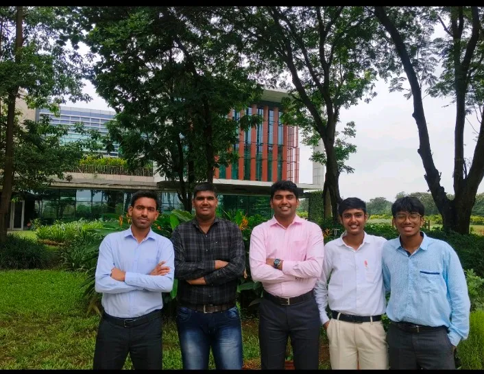 Kartik with fellow interns and engineers outside the JSW Steel office
